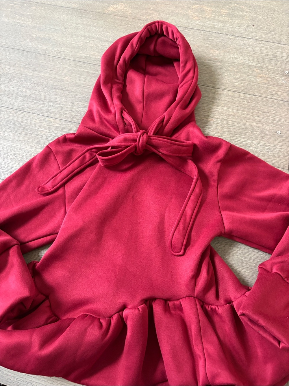 Burgundy hoodie. Never worn. No tags.